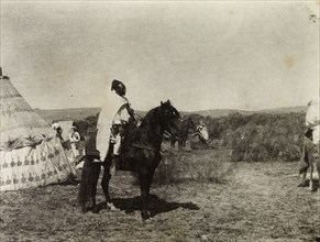 Frederick Stanbury's escort in Morocco. An African escort mounted on horseback waits to depart from