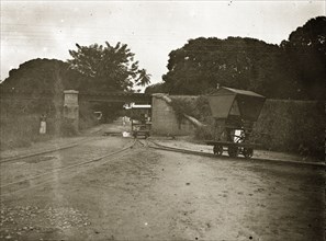 The road from Kilindini to Mombasa. A road junction on the Kilindini-Mombasa road, showing the