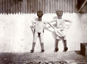 Anti-German spirit figurines. The two wooden figurines, both with hands on hips and one with a