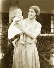 Charles Trotter as a baby. Margaret Trotter is delighted by her baby Charles as she holds him