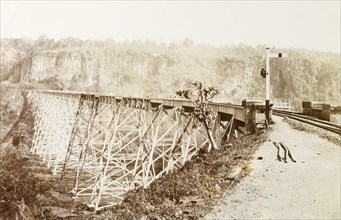The Gokteik viaduct. Shot across a ravine showing the Gokteik viaduct, a steel trestle bridge, then