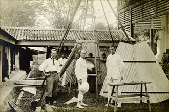 Trigonometrical Survey Office, Taipang. British surveyors pose in front of an iron beacon at the