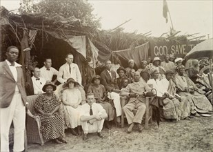 Empire Day celebrations. Informal group portrait of Africans and Europeans at Empire Day