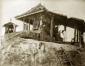 Adam's Peak shrine. Worshippers and monks at the Buddhist shrine of Adam's Peak. Ceylon (Sri