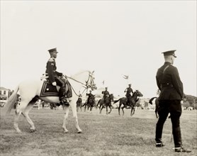 Mounted police tournament. Uniformed police officers ride their horses in a mounted police