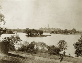 Royal Lakes, Rangoon. View over the Royal Lakes showing the Buddhist Shwe Dagon Pagoda in the