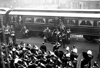 King George V arrives in Portsmouth. King George V and Queen Mary alight from the royal train at