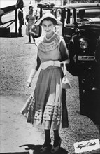 Queen Elizabeth II visiting Aden, 1954. Queen Elizabeth II smiles for the camera after arriving in