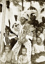 Nigerian chief, Badagry. An unidentified chief, perhaps the Akran of Badagry, is seated wearing