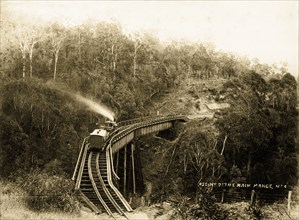 Trestle bridge, Queensland. Steam train on a railway trestle bridge on the Main Range line from