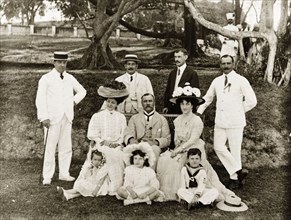 British group portrait. Outdoors portrait of a group of British men, women and children dressed in