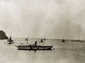 RIMS 'Minto' and fleet. RIMS 'Minto' and her fleet float off shore. These ships belong to the East