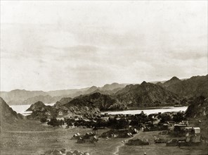 Valley outside Muscat. View across a valley outside Muscat, showing a village surrounded by