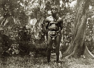 Portrait of a Jarawa man. Portrait of a Jarawa man, naked apart from a decorative belt and chest