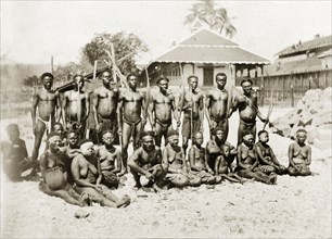 Andaman Islanders. Outdoors portrait of a group of semi-naked Andaman Islanders. The men in the