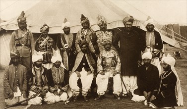 Baluchstan chiefs at the Coronation Durbar. Outdoors group portrait of Mir Mahmud Khan, Khan of