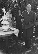 Wedding speech. A middle-aged gentleman delivers the first of the speeches, drink in hand, at the