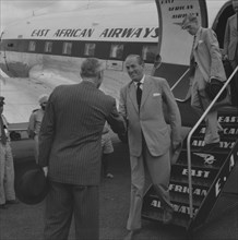 Governor greets Lennox-Boyd. Alan Tindal Lennox-Boyd (1904-1983) disembarks from an East African
