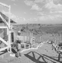 Fort Hall military camp. Armed police guard the steps of a fenced military camp for Kenyan