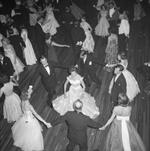 Limuru Hunt Ball. Overhead view of the dance floor, crowded with formally dressed people, at the