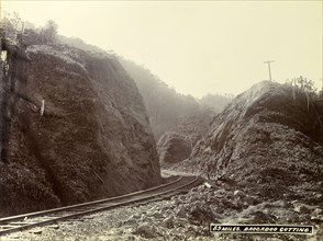 Track at 'Brocadoo Cutting'. A newly completed railway track winds around boulders at 'Brocadoo
