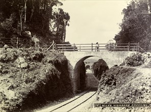 Highroad Crossing', Jamaica. Two arched road bridges span the newly completed railway track at