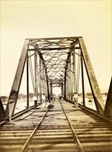 Construction workers on a bridge. Construction workers pictured on a newly completed railway bridge