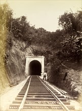 Railway tunnel 'No. 12'. A couple stand at the entrance to railway tunnel 'No. 12', located on the