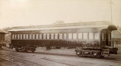 Third class carriage, Jamaica. A Jamaica Railway third class carriage sits on rails at a siding.