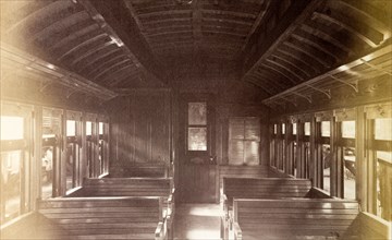 Third class carriage, Jamaica. The simple wooden interior of a Jamaica Railway third class carriage