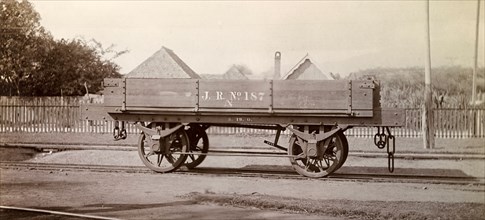 Jamaica Railway wagon. An open railway wagon inscribed 'J.R. No.187', sits on rails at a siding.