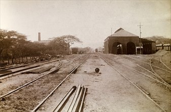 Railway sidings, Jamaica. Jamaica Railway sidings leading up to a railway shed. Jamaica, circa 1895