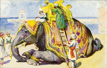 Mounting a royal tusker'. Illustration depicting three well-dressed Indian men mounting a royal