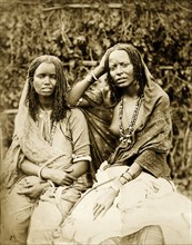 Women with braided hair. Portrait of two young women with braided hair, said to be Sudanese.