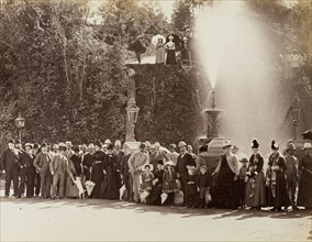 Unveiling a fountain. A crowd gathers for the unveiling of a fountain by the Maharajah of Cooch