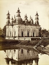 The Shahbani Begum mosque. The decorative domes of the Shahbani Begum mosque are reflected in the