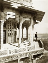 View from the Samman Burj. A lone figure takes in the view from a balcony on the Samman Burj, an