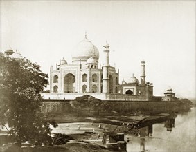 Taj Mahal from the river, circa 1885. The Taj Mahal as seen from the banks of the Yamuna River. A