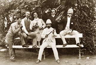 Christmas in Calcutta, 1889. Portrait of six European men celebrating Christmas in the Botanical
