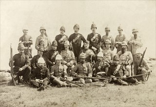 Wimbledon rifle team. 21 European and Indian members of a rifle team pose for a group portrait with