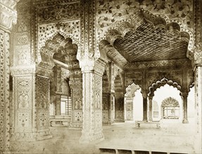Interior of the Diwan-i-Khas, Delhi. Ornate archways decorated with painted designs adorn the