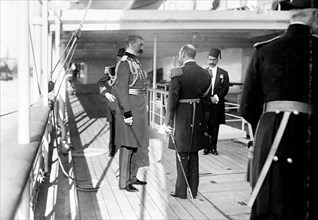 King George V and Lord Kitchener. King George V (r.1910-36) talks with Lord Kitchener (left) on the