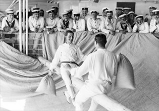 Pillow fight aboard HMS Medina. Captain Bryan Godfrey-Faussett, Equerry to King George V, and the