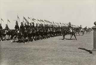 Indian cavalry parade at Delhi. An Indian cavalry regiment march past with standards at the