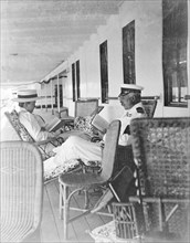 Duke and Duchess of Connaught on deck. The Duke and Duchess of Connaught sit in lounge chairs,