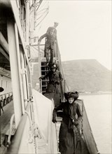 Disembarking from the S.S. Balmoral Castle. The Duke and Duchess of Connaught and their daughter,
