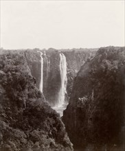 View of Victoria Falls. The Victoria Falls and surrounding cliffs as seen from the northern bank.