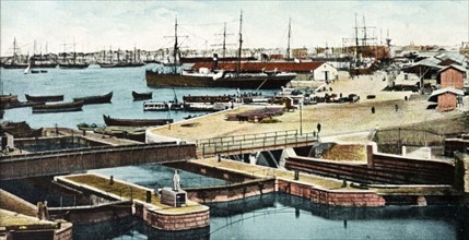 Port of Alexandria. Ships and boats at anchor in Alexandria Port. Alexandria, Egypt, circa 1920.