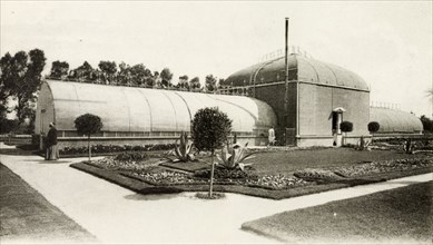 Greenhouses at Nouzha Gardens. Greenhouses in the formal Nouzha Gardens. Alexandria, Egypt, circa
