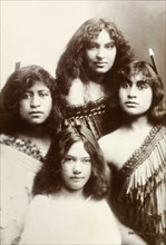 Four Maori women. Studio portrait of four young Maori women whose traditional dress has been made